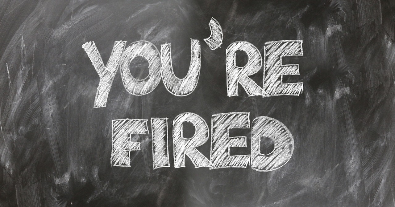 A simple sign stating "You're Fired"