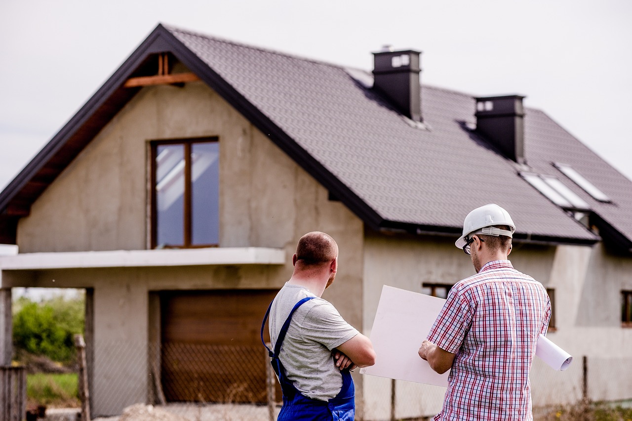 Disaster services contractor discusses restoration plans with homeowner