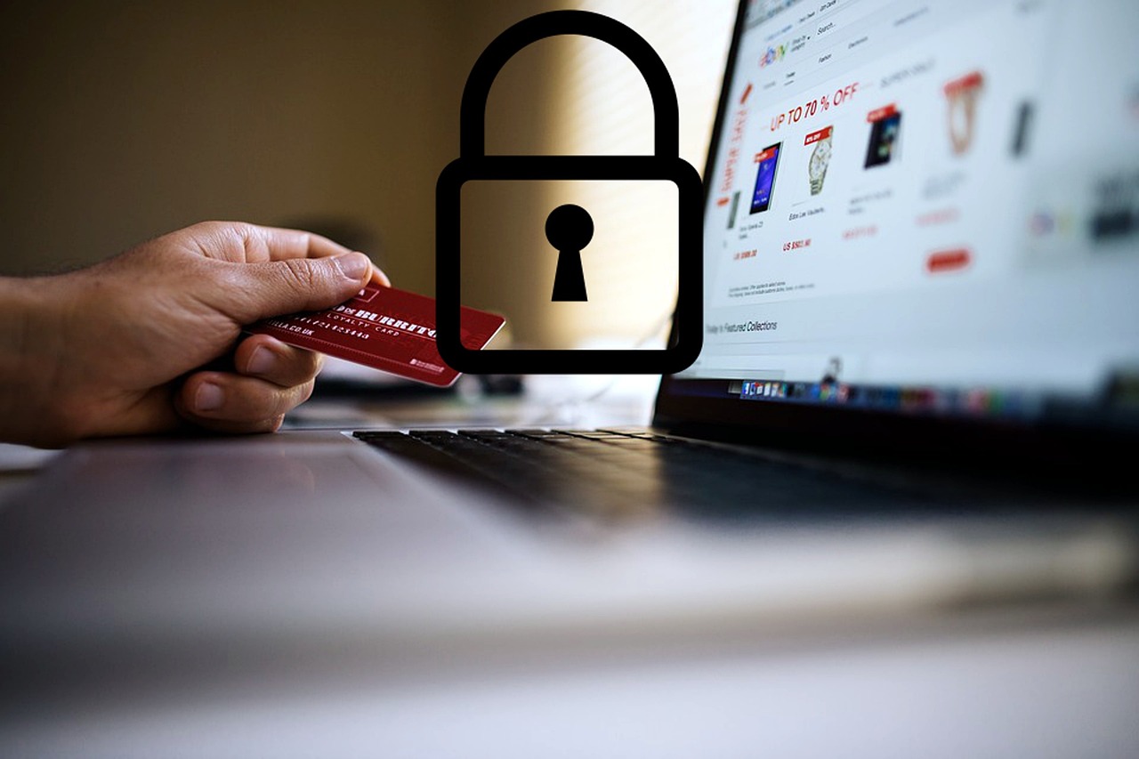 Online shopper holding credit card