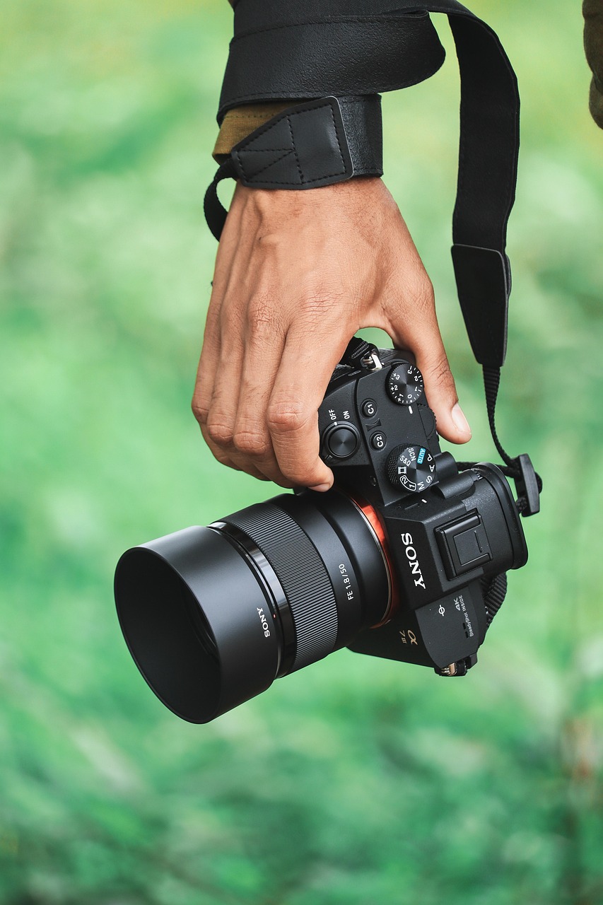 Private investigator with camera in hand