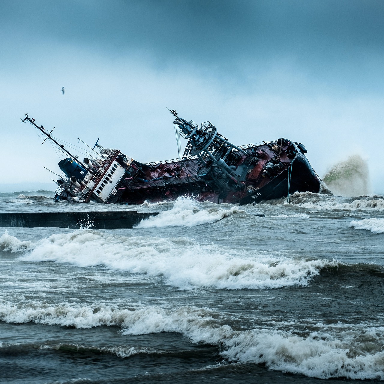 Maritime disaster unfolds as ship sinks in rough seas