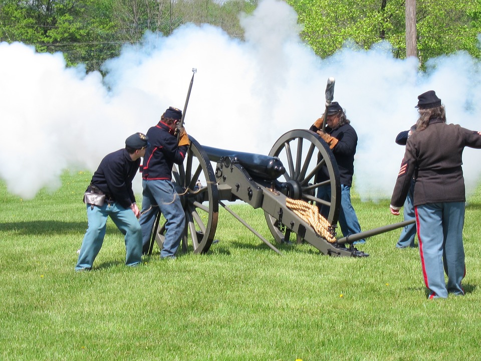 Reenactors travel to an  on-site Civil War shoot in an open field