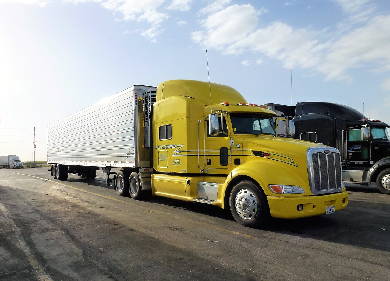 Dry van semi-trailer in a trucking facility parking lot