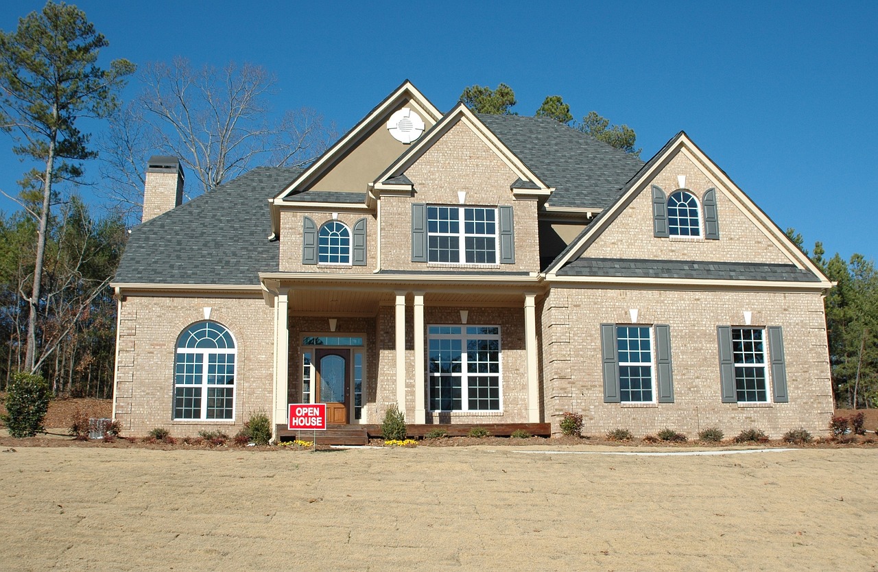 Rental home with open house sign, ready for visitors.