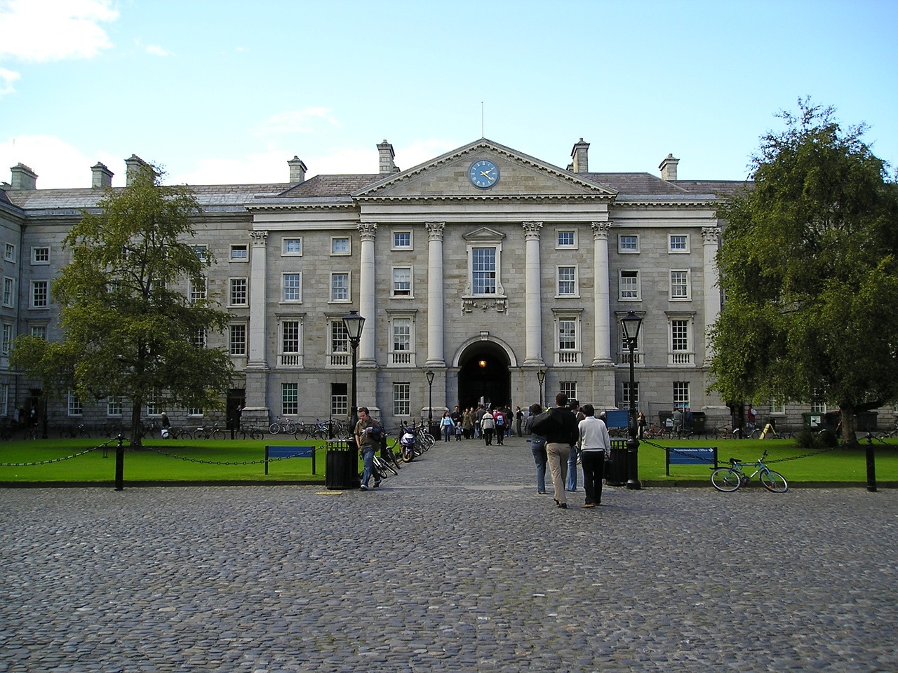 Traditional education institution frontage with clock and inviting doorway