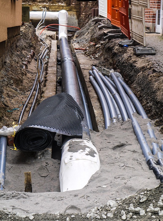 Utility damage from excavation: underground pipes exposed
