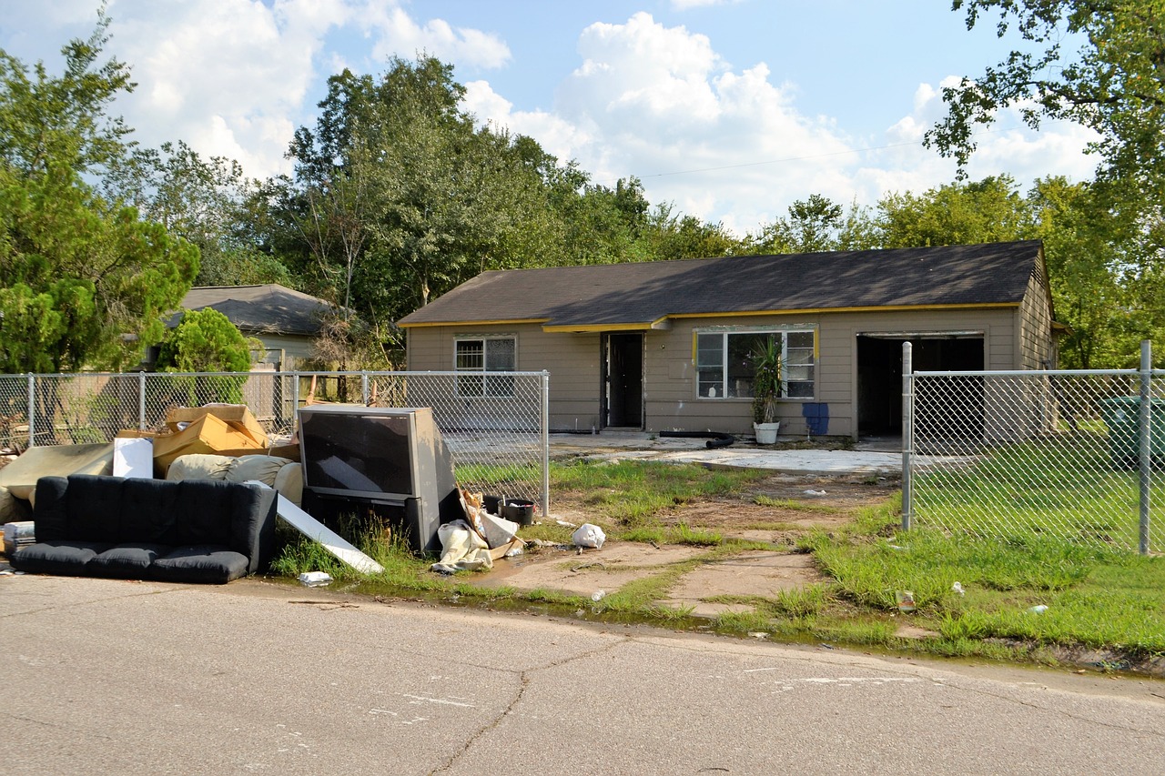 Tenants' belongings outside damaged home after emergency evacuation