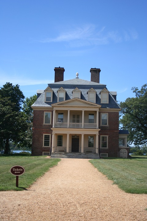 Historic home's classic facade, showcasing timeless architecture and charm.