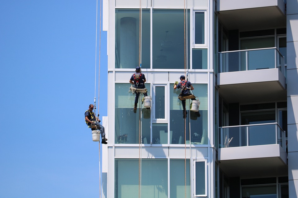 Window cleaners at work on a commercial building