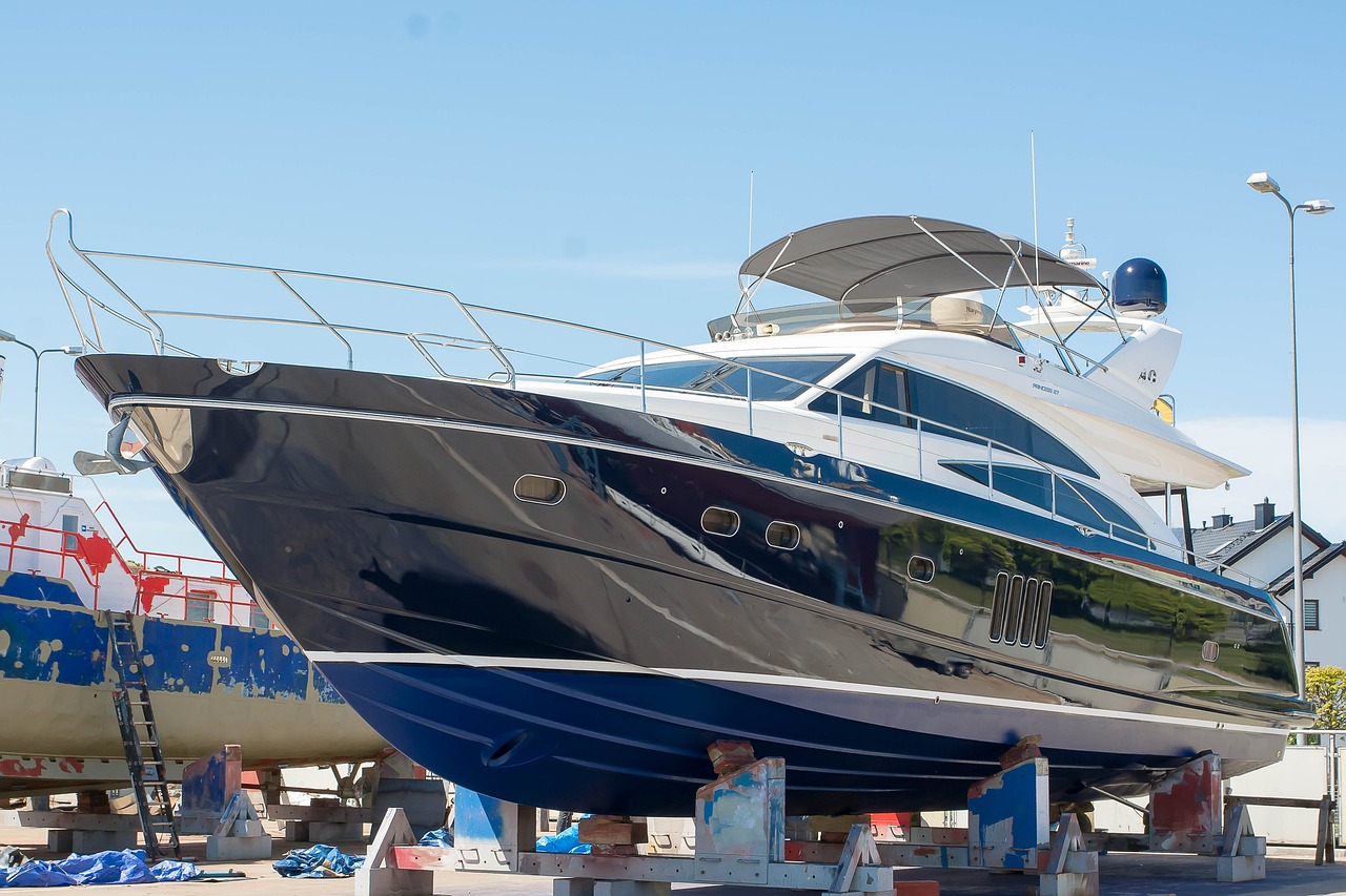 Power boat in dry dock undergoing repairs.