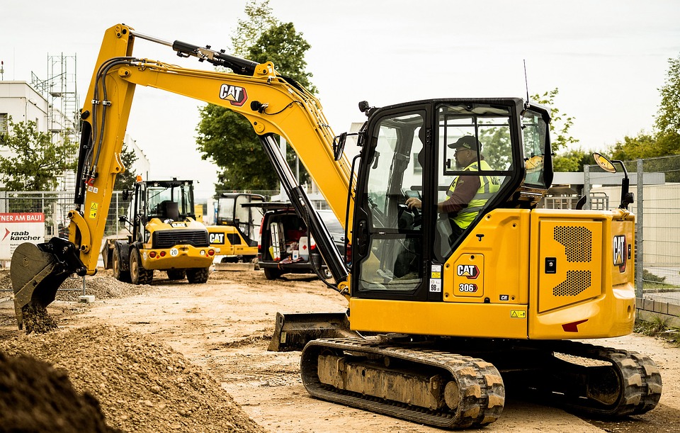 Mini excavator at work on a landscaping project