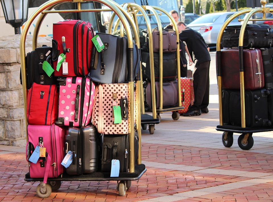 Bellboy with luggage trollleys