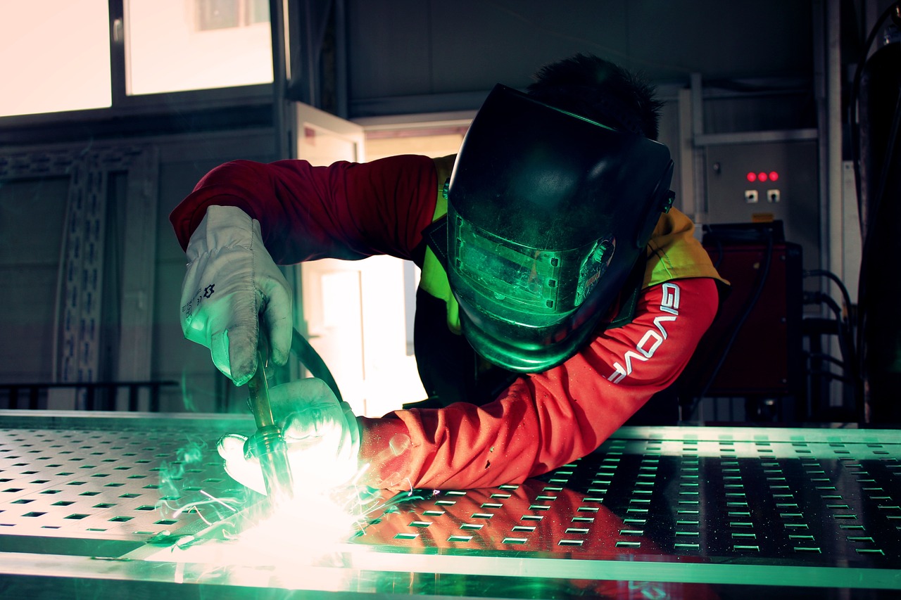 Welder precision-crafts life-saving medical equipment.