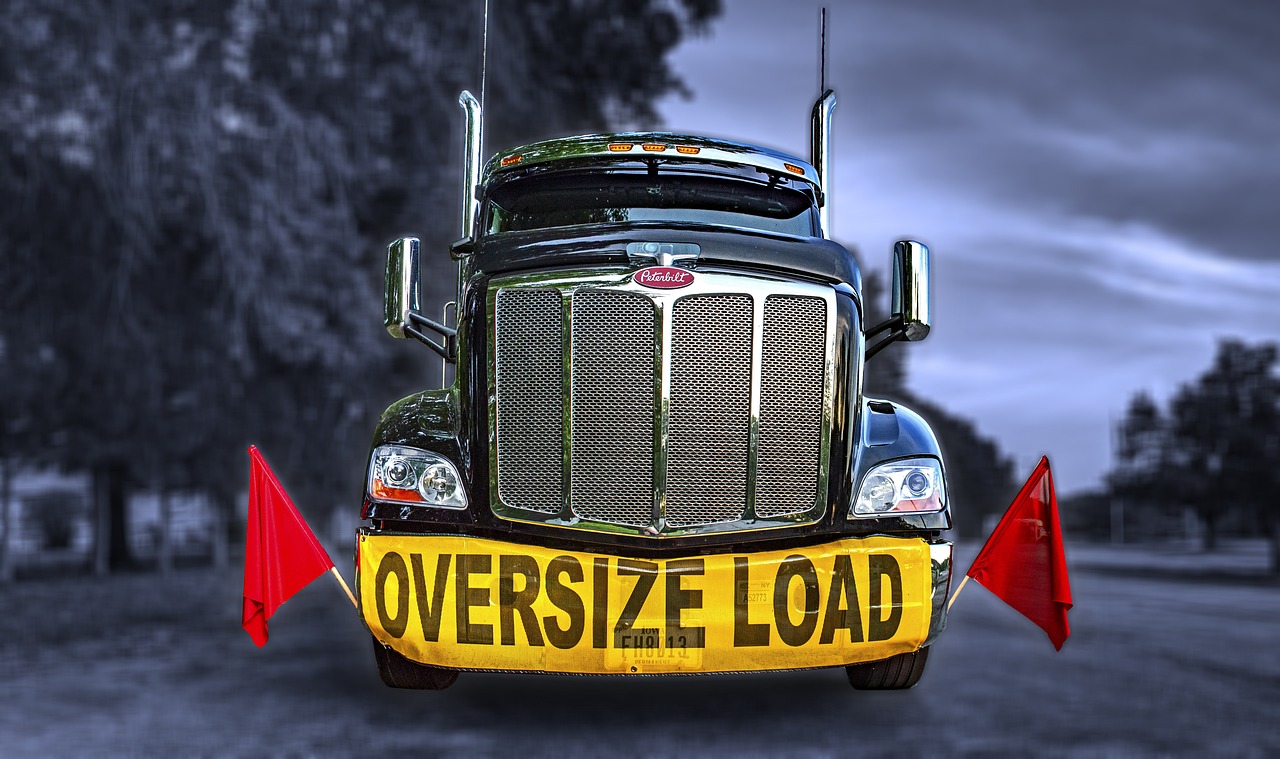 Oversized Load banner on front of truck
