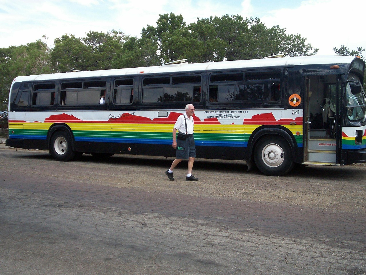 Senior prepares to board shuttle bus.