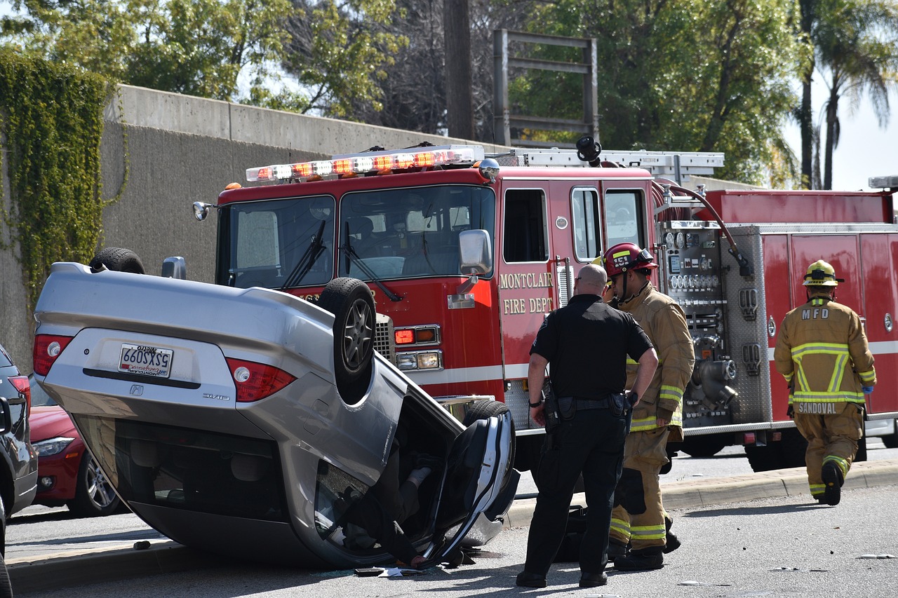 Emergency responders assisting at the scene of a car accident