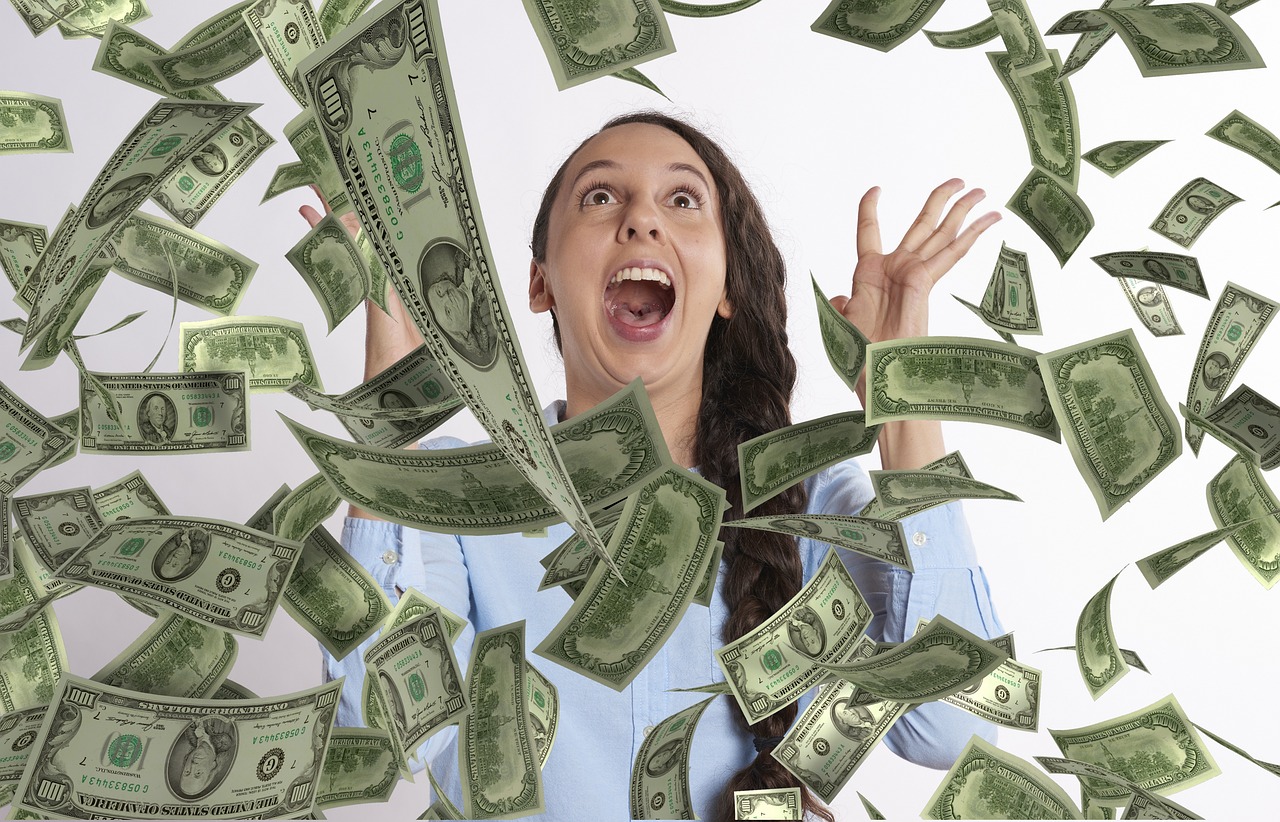 Lottery winner overjoyed as dollar bills rain down, capturing the thrill of hitting the jackpot.